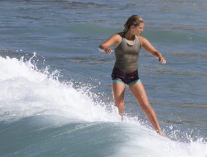 Candid surfer babes on the beach and in bikinis