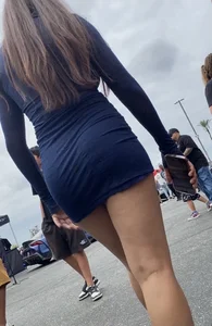 Girl with nice legs in dress