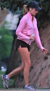 Beautiful skinny girl out for a walk in little shorts