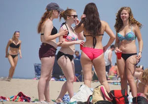Group of sexy girls on the beach in bikinis with nice bodies
