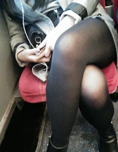 Asian babe on the bus in skirt and stockings