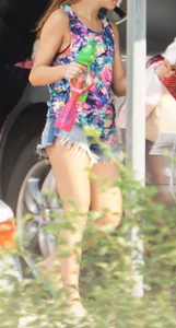 Hot teen neighbor getting ready for the beach in short shorts showing some cheek