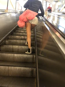 Hot Milf in Mini Shorts on the Subway Escalator and in the Train Candid Gallery