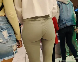 Girl with a nice ass and vtl in beige colored leggings