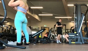 Gym blonde in turquoise leggings notices me and doesn’t mind, even moves in front of me later for some close-ups