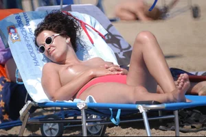 Girls on a nude beach in Bibione, Italy