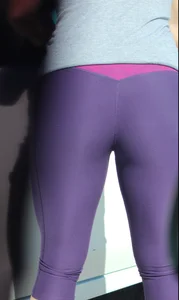 Milf with a nice ass in tight purple leggings