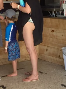 A Nice Candid Milf in a Dress With Panties Flashing