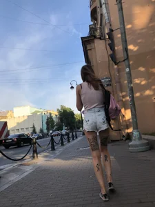 Skinny Girl in Denim Shorts With Fit Tattooed Legs Street Creepshots Gallery