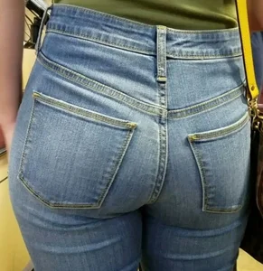 Girl in tight jeans in line. Girls with great asses always can go in front of me