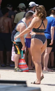 Girls in bikinis getting ready for tubing