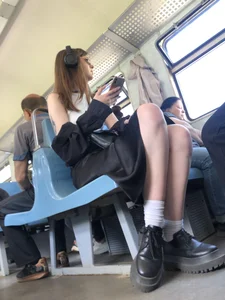 Hot Girl in a Dress With Great Legs Sitting in a Public Train Creepshots