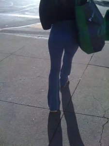Firm ass and slim legs in tight pants street creepshot