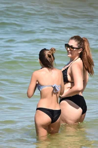 Sexy group of girls on the beach in various sizes