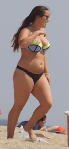 Thick girl on the beach in a bikini