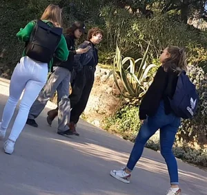 Two beautiful teens in jeans. One white and one blue jeans