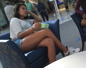 Girl in Shorts With Hot Crossed Legs Sitting at the Mall Creepshot