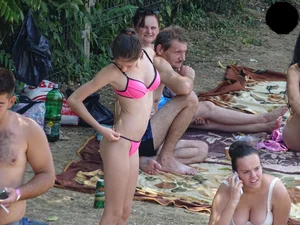 Beautiful and sexy teen in pink thong bikini