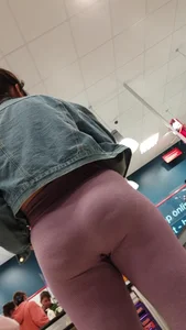 Shopping girl ass view in que