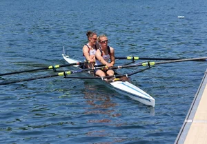Sexy row girls in tight tops and spandex shorts