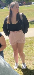 Busty chubby college girl at a dog park