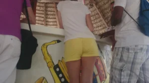 Milf in yellow shorts with vpl and a wedgie
