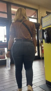 Pawg blonde filling out jeans. Slight VPL