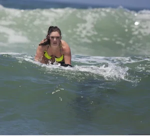 Candid surfer babes on the beach and in bikinis