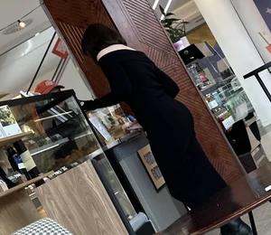 Brunette college girl with a perfect ass in a very tight dress