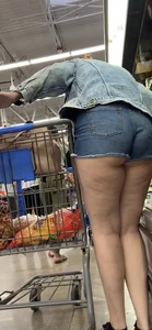 Thick White girl Butt peeping out of shorts