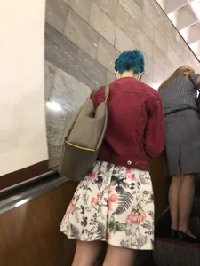 Skinny Legs of a Blue Haired Girl on a Subway Escalator Closeup Creepshots
