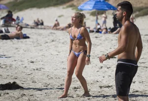Cute candid beach volleball player in a swimsuit creepshots