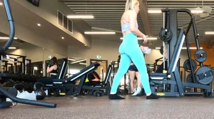 Gym blonde in turquoise leggings notices me and doesn’t mind, even moves in front of me later for some close-ups