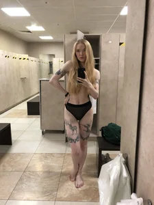 Hot Tattooed Girl in Panties With No Bra - Her Hair Covering Her Breast Locker Room Sexy Selfie