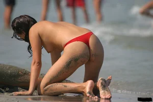 Sexy candid topless and nude beach girls