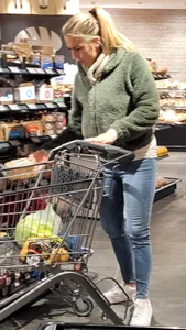 Blonde milf in tight jeans at the store creepshots