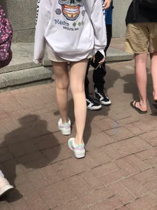 Blonde candid teen in shorts with hot slim legs street creepshots