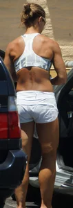 Fit babe in white shorts with big boobs in athletic top