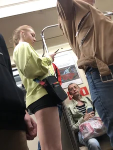 Hot subway candid girl in shorts with hot slim legs closeups