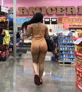 Latina with hard nipples and a big booty in tight spandex shorts outfit