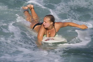 Candid surfer babes on the beach and in bikinis
