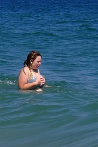 Busty bbw girl couldn’t contain huge boobs in bikini pt 2