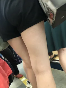 Candid Slim Legs in Shorts And Booty Closeup in the Subway Train