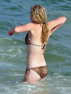 Cheetah print bikini blonde at the beach with nice body