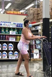 Thick Latina babe with a nice ass in tight patterned shorts