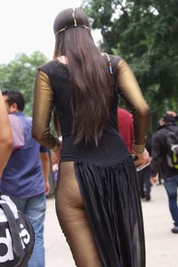Sexy brunette in hot costume outfit