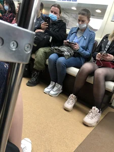 Candid Girl in Sunglasses And Black Pantyhose With Hot Thin Legs Sitting in a Subway Train Creepshots