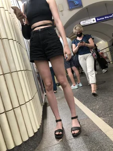 Amazing Hot Skinny Candid Girl in Shorts And Sandals Touching Her Leg on a Subway Station Creepshots Gallery