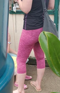 Milf shopping with a nice ass in tight maroon leggings