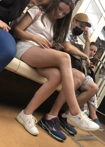 Cute Teen Girl in Shorts in Subway Train Candid Photos